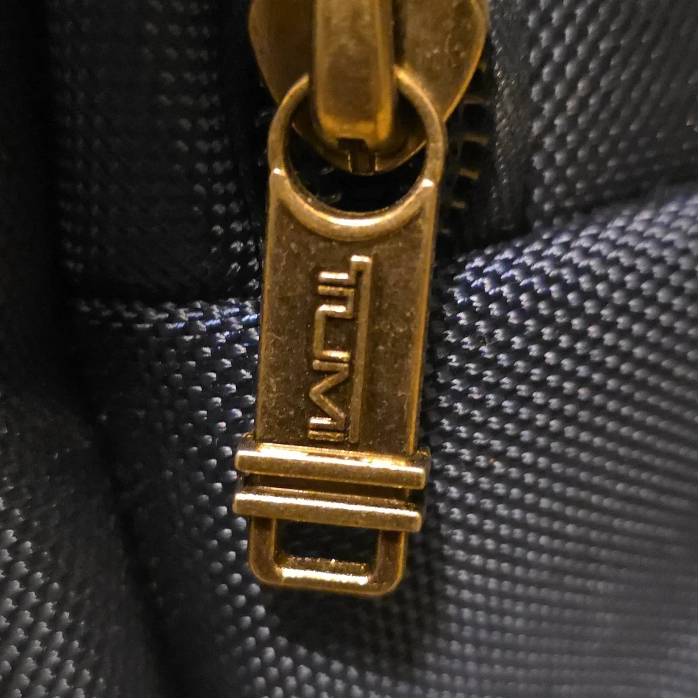 Tumi Navy and Brown Roll-Top Backpack